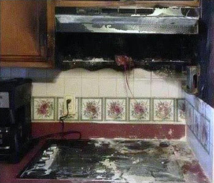 stove burned, smoke damage on wall, coffee maker plugged